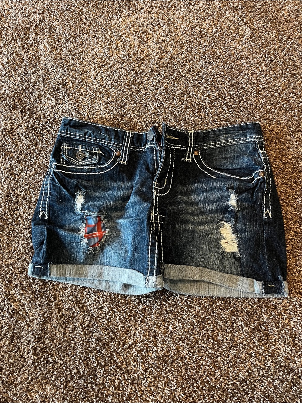 Maurices Dark Wash Distressed Denim Shorts with Red Plaid Patch